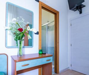 TV a/nebo společenská místnost v ubytování Hotel Sultano