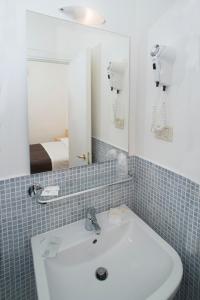 Koupelna v ubytování K2 Hotel