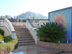 a staircase on the side of a building at Hotel Costa Brava in Blanes