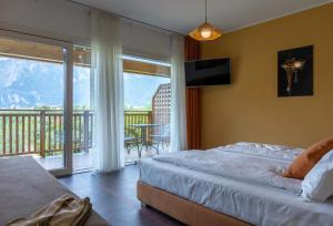 Posteľ alebo postele v izbe v ubytovaní O_live Agriresort + 37 fotografií