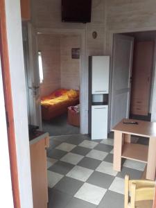 Łóżko lub łóżka w pokoju w obiekcie jumi