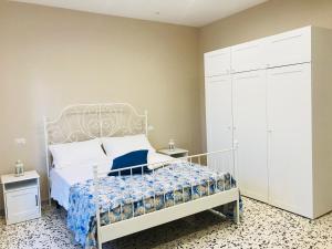 Postel nebo postele na pokoji v ubytování B&B Miccio