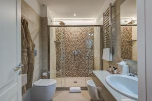 Koupelna v ubytování Borgo La Chiaracia Resort & SPA
