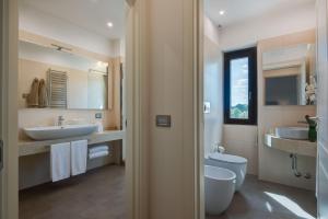 Koupelna v ubytování Borgo La Chiaracia Resort & SPA