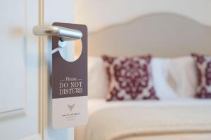 Postel nebo postele na pokoji v ubytování Borgo La Chiaracia Resort & SPA