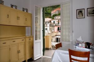 Kuchyň nebo kuchyňský kout v ubytování Guesthouse Rollando