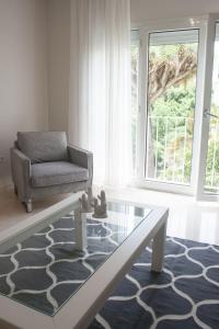 Posezení v ubytování Lavaderos Suites