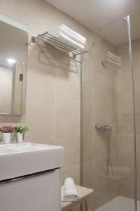 Koupelna v ubytování Lavaderos Suites