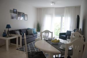 Posezení v ubytování Lavaderos Suites