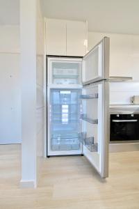 A kitchen or kitchenette at Alex Sun