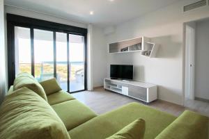 A television and/or entertainment centre at Alex Sun