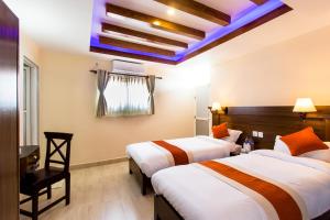 Katil atau katil-katil dalam bilik di Hotel Beijing Lu