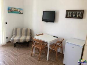 TV a/nebo společenská místnost v ubytování Magi - Camera Talia