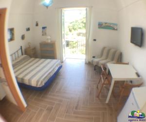 Postel nebo postele na pokoji v ubytování Magi - Camera Talia