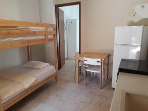 Postel nebo postele na pokoji v ubytování Almirikia Apartments