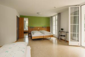 Bienenberg - Das Genusshotel im Grünen - Liestal客房内的一张或多张床位