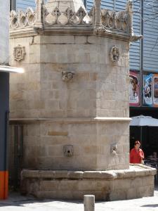 a stone building with avisor on top of it at Hotel Costa Brava in Blanes