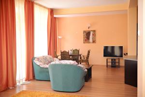 TV a/nebo společenská místnost v ubytování Family Art-Hotel Zora