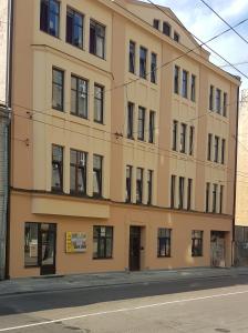 a large building on the side of a street at EBU 28 in Rīga
