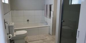 Koupelna v ubytování Clarens Escape