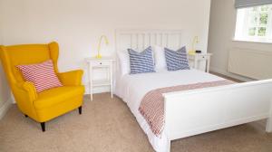 Letto o letti in una camera di Five Bells Inn, Wrentham