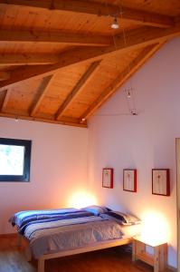 Postelja oz. postelje v sobi nastanitve B&B Il Vigneto