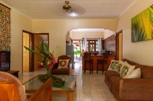 A seating area at Villas des Alizes beachfront suites and garden villas