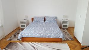 Posteľ alebo postele v izbe v ubytovaní Apartment Central