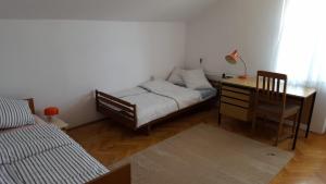 Posteľ alebo postele v izbe v ubytovaní Apartment Central