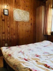 Ένα ή περισσότερα κρεβάτια σε δωμάτιο στο Apartmani Božana Vojinović