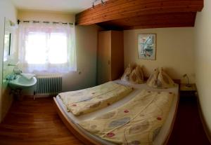 Postel nebo postele na pokoji v ubytování Haus Salzachblick