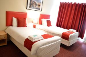 Postel nebo postele na pokoji v ubytování Hotel Express Newcastle Gateshead