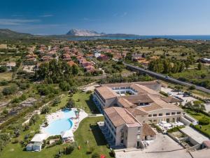 an aerial view of a resort with a swimming pool at Hotel San Teodoro in San Teodoro
