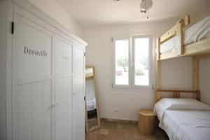 Ένα ή περισσότερα κρεβάτια σε δωμάτιο στο Apulia Home