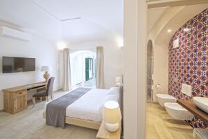 Postel nebo postele na pokoji v ubytování B&B Marina Garden