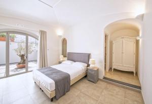 Postel nebo postele na pokoji v ubytování B&B Marina Garden