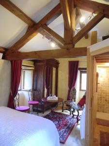 Postel nebo postele na pokoji v ubytování Transgardon B&B en Cévennes