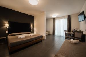 TV a/nebo společenská místnost v ubytování Garda Guest House