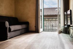 Posedenie v ubytovaní Lazise Boutique Apartment Lago e Relax
