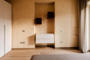 Posteľ alebo postele v izbe v ubytovaní Lazise Boutique Apartment Lago e Relax