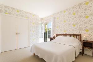 Ein Bett oder Betten in einem Zimmer der Unterkunft Hotel Les Goelands
