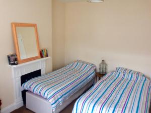 Ένα ή περισσότερα κρεβάτια σε δωμάτιο στο Kilreany