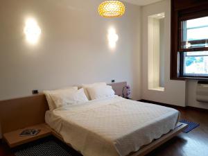 A bed or beds in a room at AD Home centro
