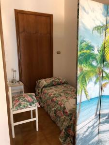 A bed or beds in a room at La sirenetta bellicosa