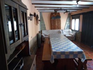 A bed or beds in a room at Apartamentos turísticos La Fuensanta
