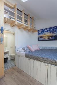 Posteľ alebo postele v izbe v ubytovaní Guest House Blue