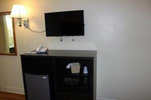 A television and/or entertainment centre at Fairview Inn Wilmington