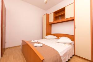 Postel nebo postele na pokoji v ubytování Apartments A cappella music