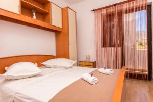 Postel nebo postele na pokoji v ubytování Apartments A cappella music