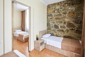 Katil atau katil-katil dalam bilik di Hotel Old Borjomi